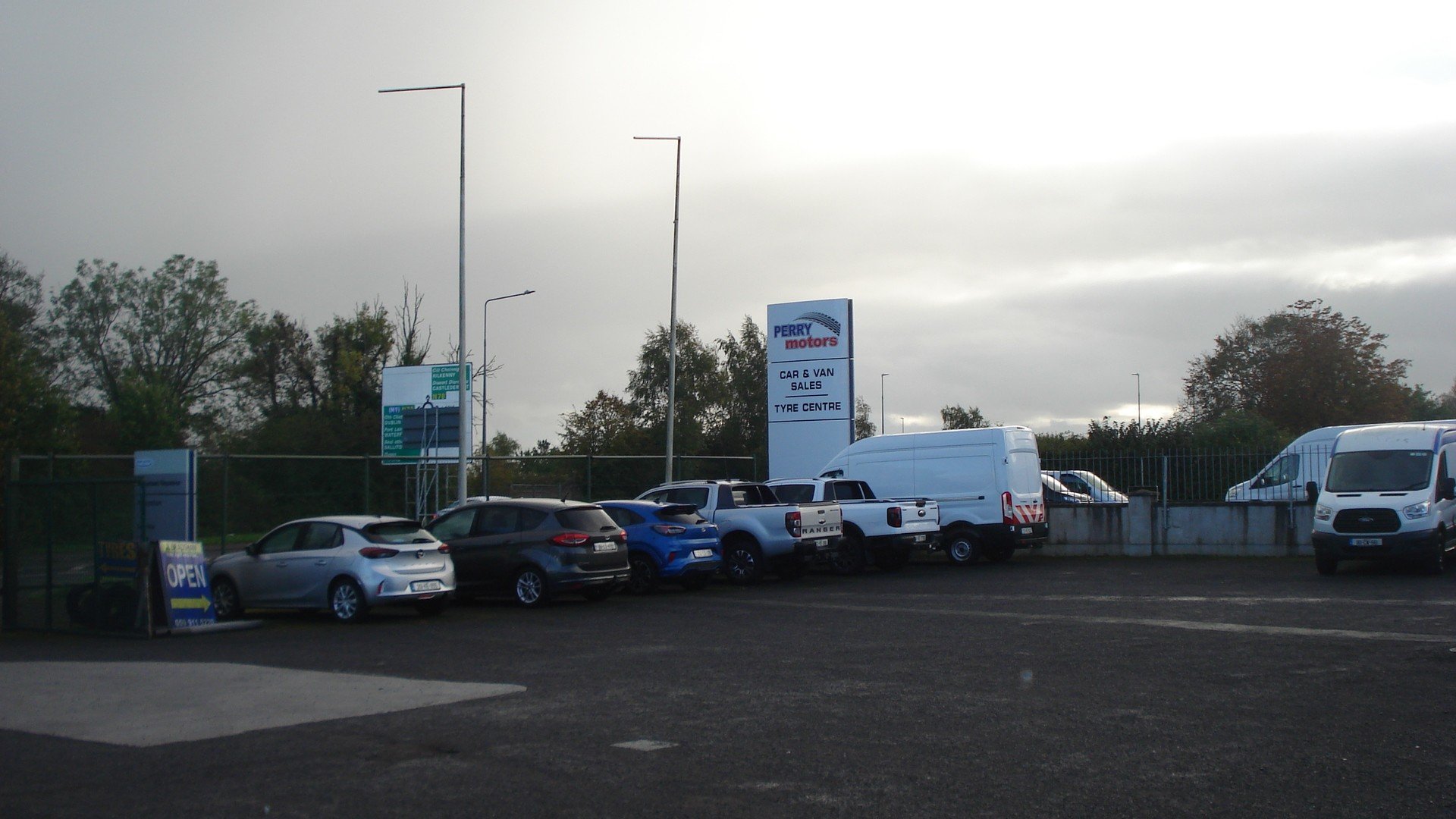 Cars and vans for sale on the Perry Motors forecourt, Athy